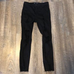 black ripped hollister jeggings